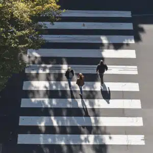 Pedestrians crossing a road.